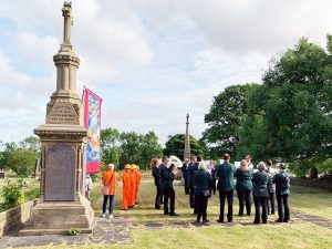 Playing the hymn Gresford